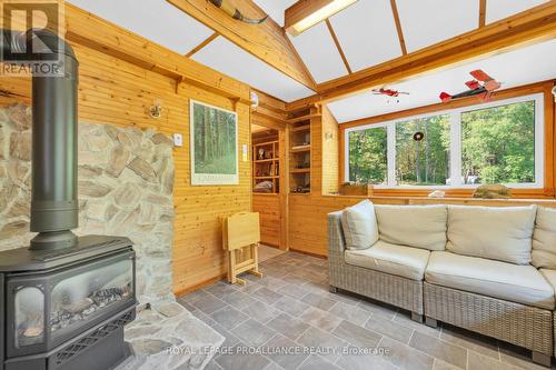 174 Cottage Lane, Tweed, ON - Indoor Photo Showing Living Room With Fireplace