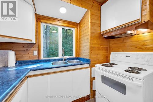 174 Cottage Lane, Tweed, ON - Indoor Photo Showing Kitchen With Double Sink