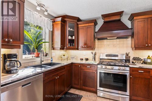 10093 Herbert Street, Lambton Shores (Port Franks), ON - Indoor Photo Showing Kitchen With Double Sink