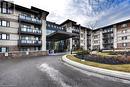 221 - 128 Garden Drive, Oakville, ON  - Outdoor With Balcony With Facade 