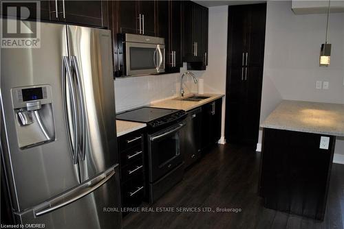 221 - 128 Garden Drive, Oakville, ON - Indoor Photo Showing Kitchen With Stainless Steel Kitchen