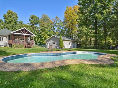 Pool - 16 Rue Du Boisé-Normand, Sainte-Anne-Des-Plaines, QC - Outdoor With In Ground Pool With Backyard