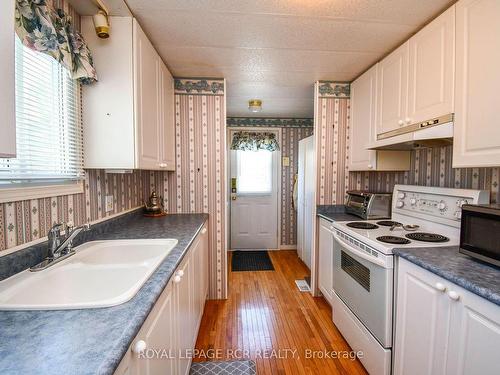 1 Main St, Innisfil, ON - Indoor Photo Showing Kitchen With Double Sink