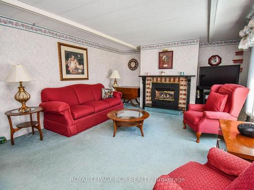 1 Main St, Innisfil, ON - Indoor Photo Showing Living Room With Fireplace