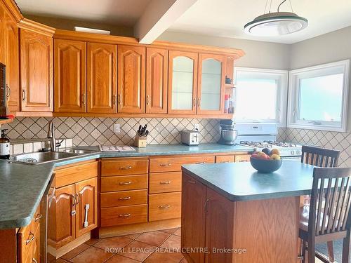 876 West 5Th St, Hamilton, ON - Indoor Photo Showing Kitchen With Double Sink