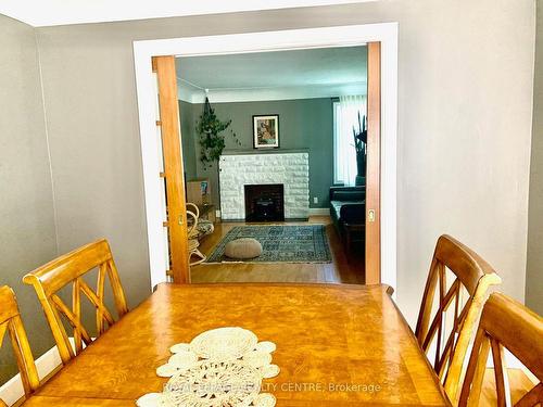 876 West 5Th St, Hamilton, ON - Indoor Photo Showing Dining Room With Fireplace