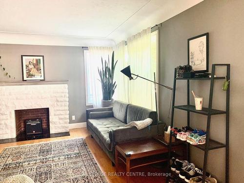 876 West 5Th St, Hamilton, ON - Indoor Photo Showing Living Room With Fireplace