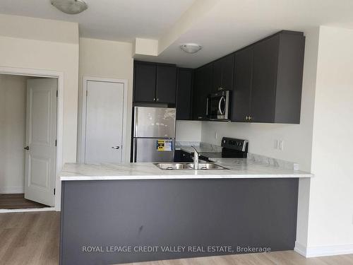 104-160 Densmore Rd, Cobourg, ON - Indoor Photo Showing Kitchen With Double Sink