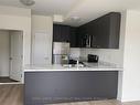 104-160 Densmore Rd, Cobourg, ON  - Indoor Photo Showing Kitchen With Double Sink 