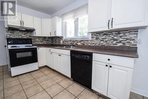 17 Grosvenor Street N, St. Catharines, ON - Indoor Photo Showing Kitchen With Double Sink