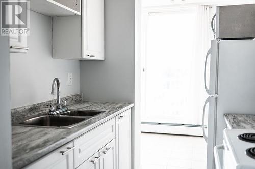 701 1501 Queensway Street, Prince George, BC - Indoor Photo Showing Kitchen With Double Sink