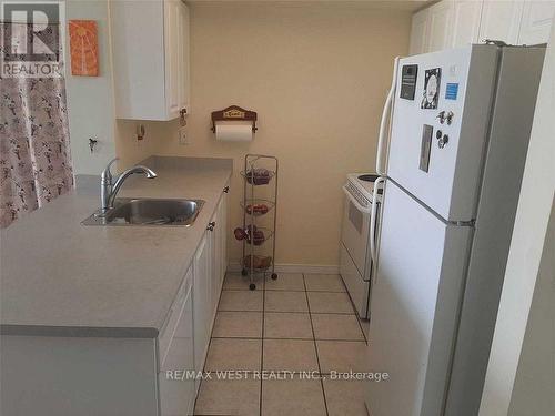 401 - 300 Ray Lawson Boulevard, Brampton, ON - Indoor Photo Showing Kitchen