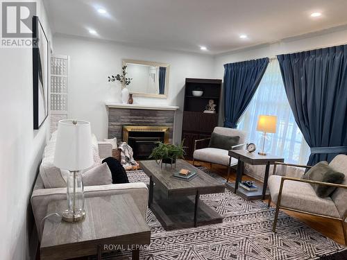 55 Tozer Avenue, London, ON - Indoor Photo Showing Living Room With Fireplace