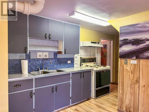 1913  3B Highway, Fruitvale, BC - Indoor Photo Showing Kitchen With Double Sink