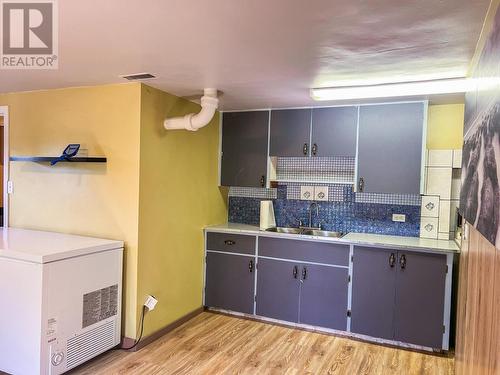 1913  3B Highway, Fruitvale, BC - Indoor Photo Showing Laundry Room