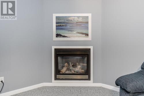 16 - 358 Little Avenue, Barrie (Painswick North), ON - Indoor Photo Showing Living Room With Fireplace