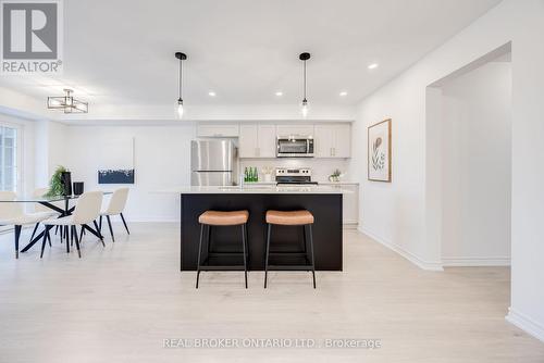 5 - 11 Tobias Lane N, Barrie, ON - Indoor Photo Showing Kitchen With Upgraded Kitchen