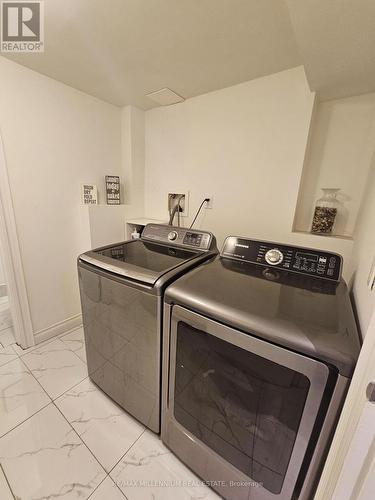 65 Vange Crescent, Toronto (Mount Olive-Silverstone-Jamestown), ON - Indoor Photo Showing Laundry Room