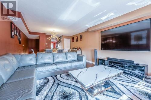 41 Padbury Trail, Brampton, ON - Indoor Photo Showing Living Room With Fireplace