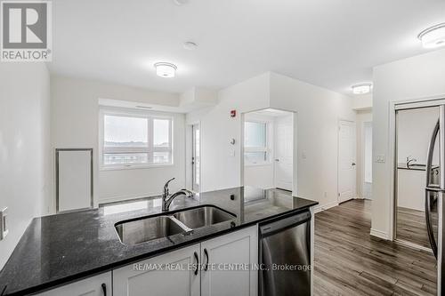 421 - 200 Lagerfeld Drive, Brampton, ON - Indoor Photo Showing Kitchen With Double Sink