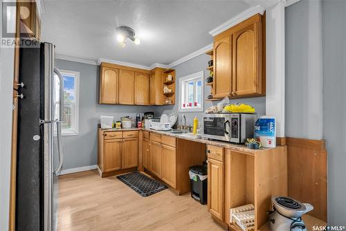 111 I Avenue S, Saskatoon, SK - Indoor Photo Showing Kitchen With Double Sink