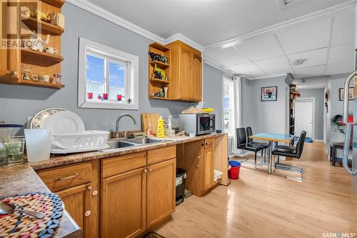 111 I Avenue S, Saskatoon, SK - Indoor Photo Showing Kitchen With Double Sink