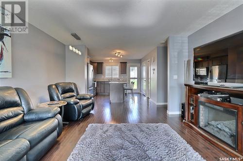 46 4101 Preston Crescent, Regina, SK - Indoor Photo Showing Living Room With Fireplace