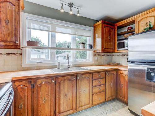 Kitchen - 144  - 146 Rue Mainville, Sainte-Thérèse, QC - Indoor Photo Showing Kitchen With Double Sink