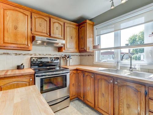 Kitchen - 144  - 146 Rue Mainville, Sainte-Thérèse, QC - Indoor Photo Showing Kitchen With Double Sink