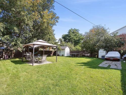 Backyard - 21 Rue St-Jacques E., Sainte-Thérèse, QC - Outdoor With Backyard