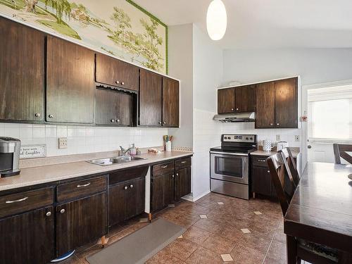 Kitchen - 21 Rue St-Jacques E., Sainte-Thérèse, QC - Indoor Photo Showing Kitchen With Double Sink