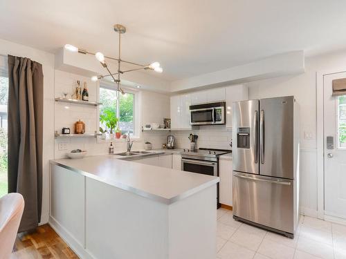 Cuisine - 186 Rue Delorme, Rosemère, QC - Indoor Photo Showing Kitchen With Double Sink