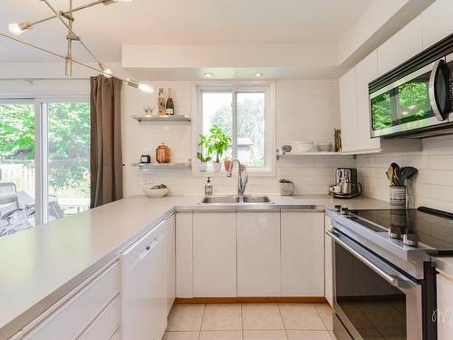 Cuisine - 186 Rue Delorme, Rosemère, QC - Indoor Photo Showing Kitchen With Double Sink