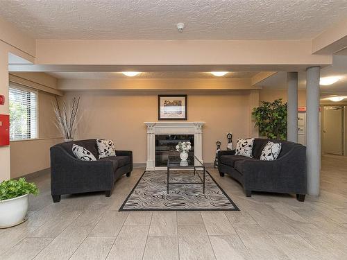 419-1005 Mckenzie Ave, Saanich, BC - Indoor Photo Showing Living Room With Fireplace