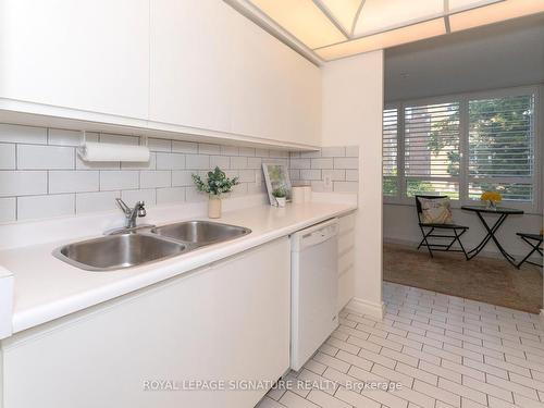 309-1200 Don Mills Rd, Toronto, ON - Indoor Photo Showing Kitchen With Double Sink