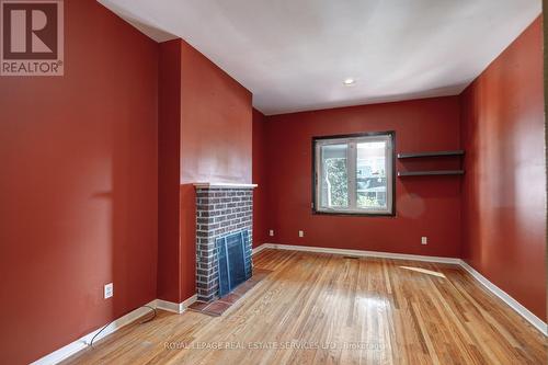 24 Leuty Avenue, Toronto, ON - Indoor Photo Showing Other Room With Fireplace