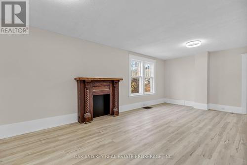 23 Carfrae Street, London, ON - Indoor Photo Showing Other Room With Fireplace