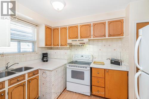 48 Faversham Crescent, Toronto, ON - Indoor Photo Showing Kitchen With Double Sink