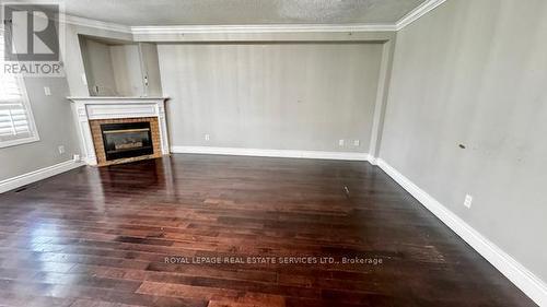 94 Ravenscliffe Court, Brampton, ON - Indoor Photo Showing Other Room With Fireplace