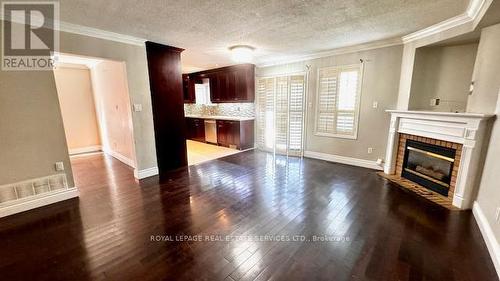 94 Ravenscliffe Court, Brampton, ON - Indoor Photo Showing Living Room With Fireplace