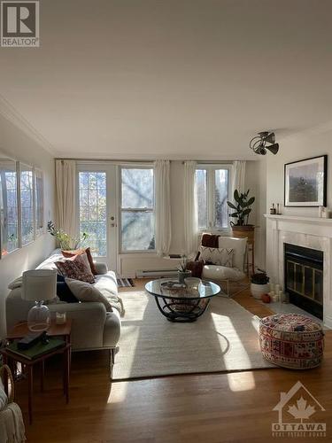 100 Bruyere Street Unit#301, Ottawa, ON - Indoor Photo Showing Living Room With Fireplace