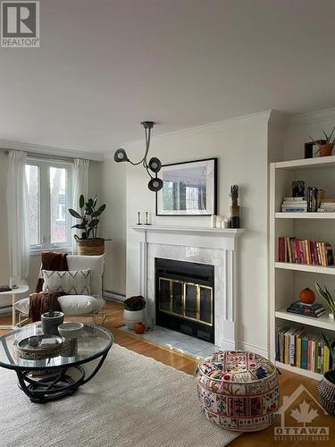 100 Bruyere Street Unit#301, Ottawa, ON - Indoor Photo Showing Living Room With Fireplace