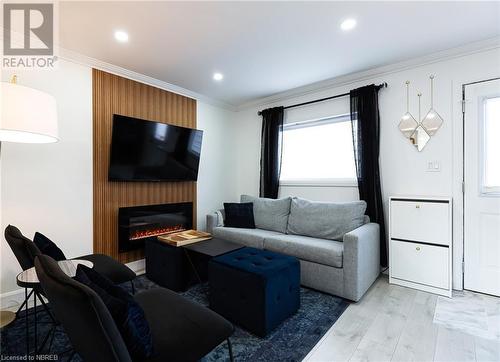 349 Third Avenue W, North Bay, ON - Indoor Photo Showing Living Room With Fireplace