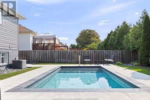 1035 Monarch Meadows, Lakeshore, ON - Outdoor With In Ground Pool