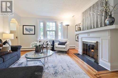 141 Sutherland Drive, Toronto, ON - Indoor Photo Showing Living Room With Fireplace