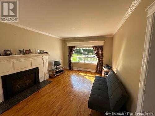 142 Eddy, Dalhousie, NB - Indoor Photo Showing Living Room With Fireplace