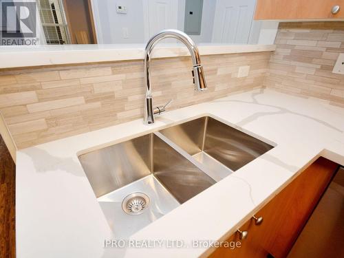 308 - 1491 Maple Avenue W, Milton (Dempsey), ON - Indoor Photo Showing Kitchen With Double Sink