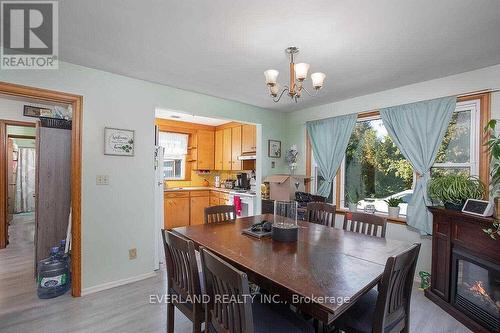 67 Hillsview Road, Bradford West Gwillimbury, ON - Indoor Photo Showing Dining Room With Fireplace