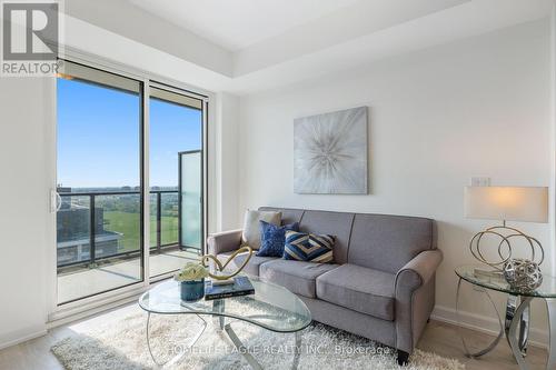 1709 - 3220 William Coltson Avenue, Oakville, ON - Indoor Photo Showing Living Room