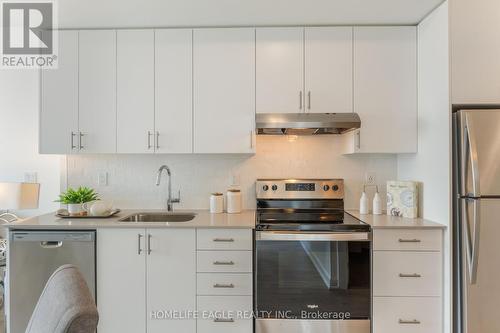 1709 - 3220 William Coltson Avenue, Oakville, ON - Indoor Photo Showing Kitchen With Stainless Steel Kitchen With Upgraded Kitchen